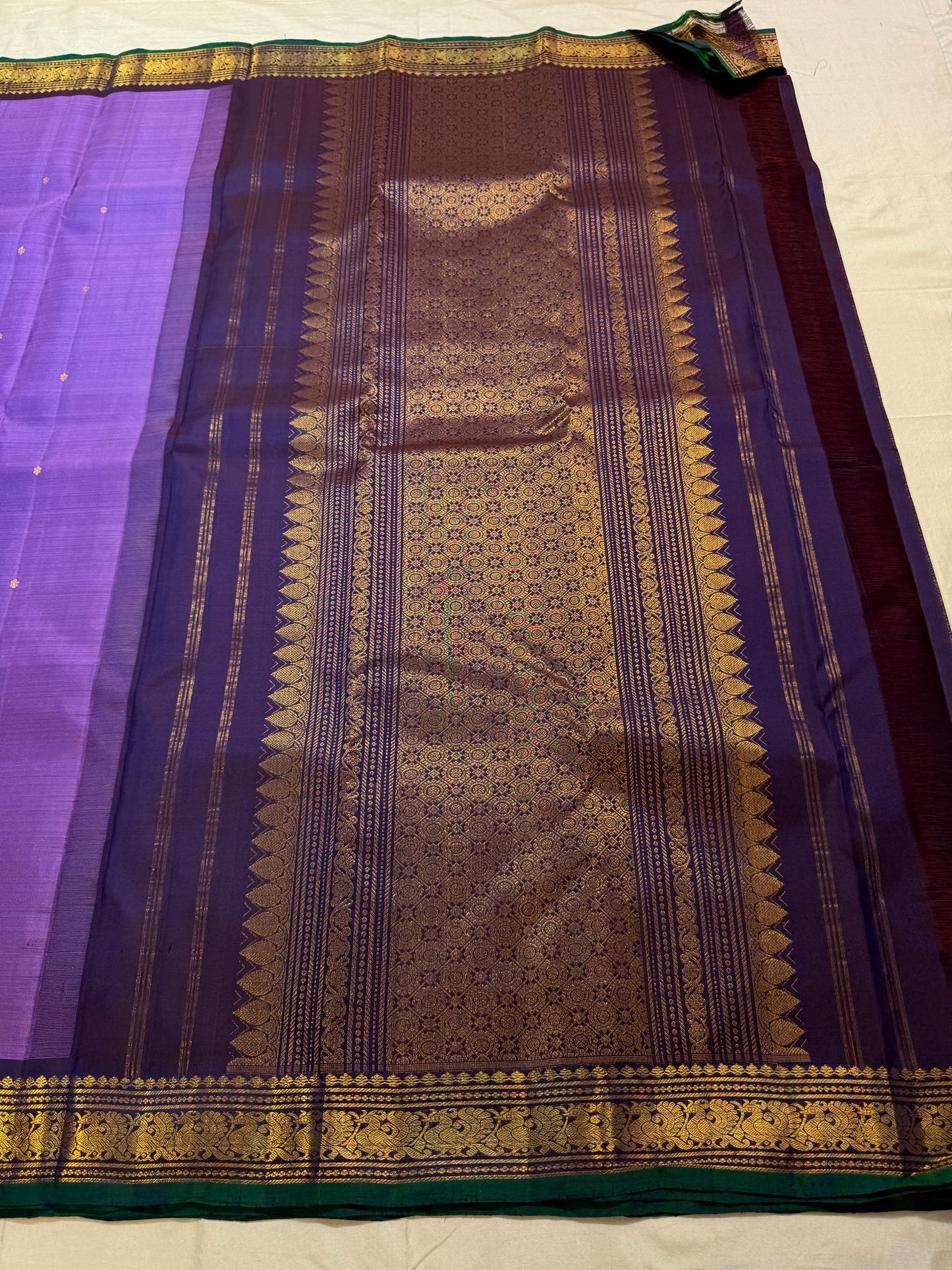 Purple handwoven pure silk Kancheepuram saree with petite peacock Korvai border — Idam Living
