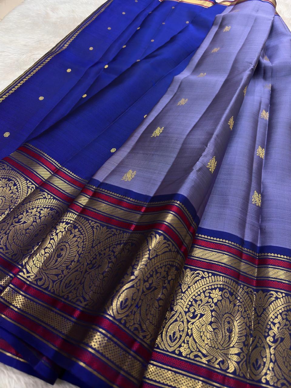 Purple korvai pure silk saree with sorgavaasal mayil motif – close-up view