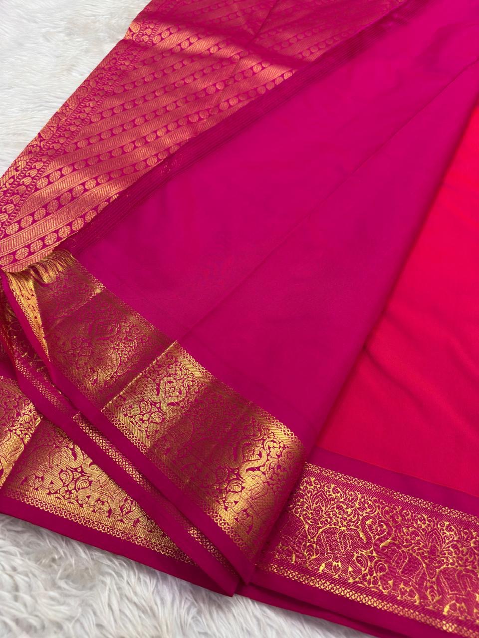 Festive purple Kanjivaram silk saree with mayil chakram butta detailing