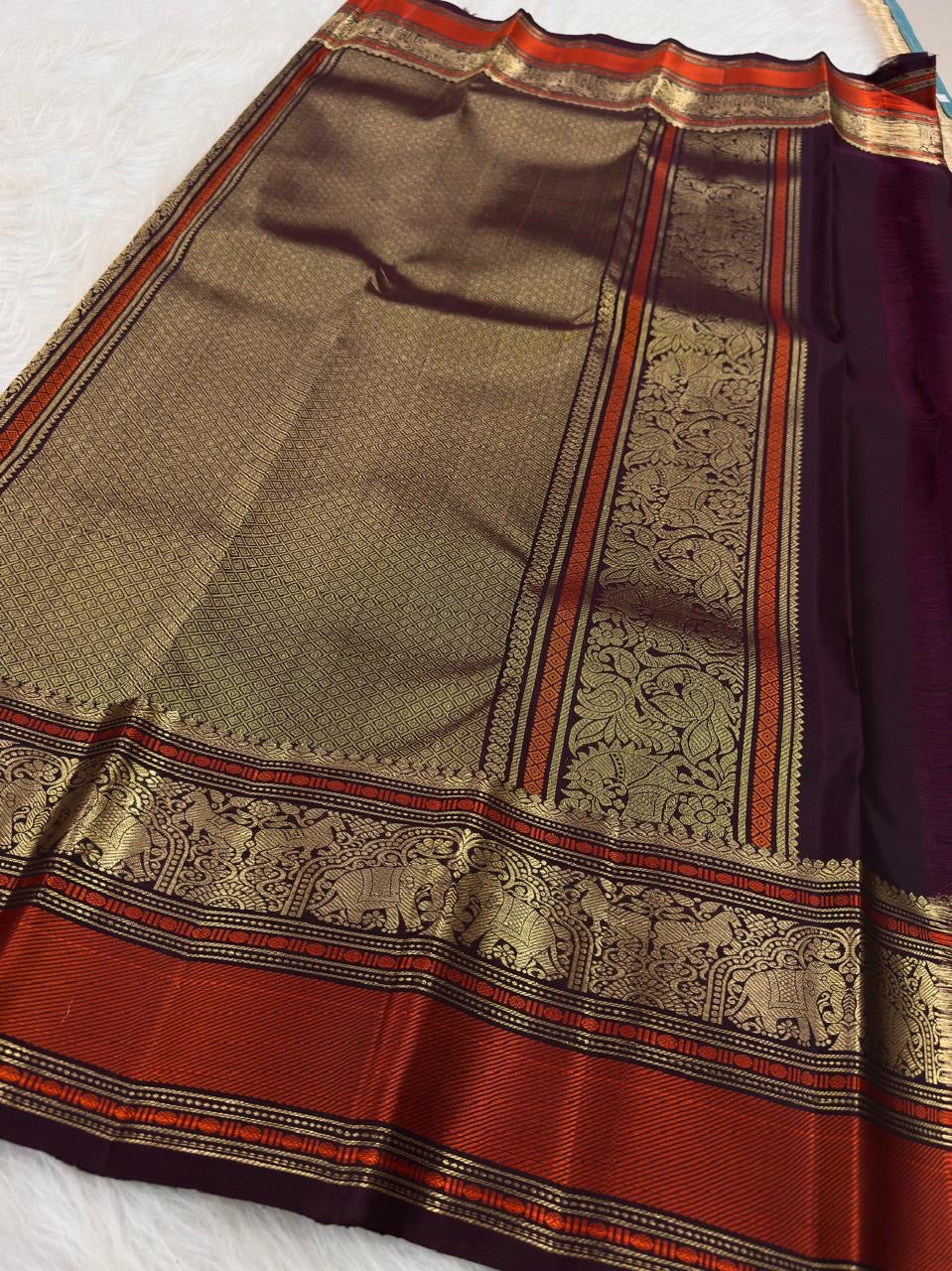 Deep Purple orange and gold multi-register Varisaipet border on handwoven KanchiPattu silk.