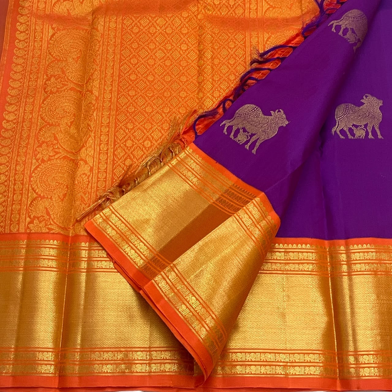 Royal Purple and Radiant Orange handwoven Pure Silk Kanjivaram saree