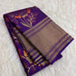 Royal Violet pure silk saree with intricate botanical zari coloration and antique-gold border.
