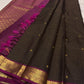 Full view of deep brown checked pure Kanchipuram silk saree with magenta zari border and tassels, available in the USA