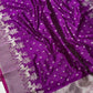 Purple Pattu Silk Chanderi saree showing silver floral buttas, deer and palm border, and broad silver woven pallu