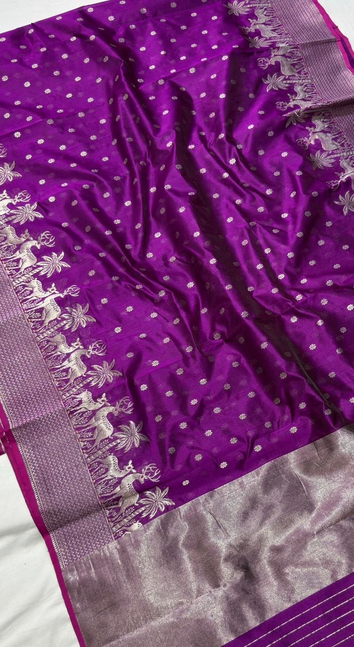 Purple Pattu Silk Chanderi saree showing silver floral buttas, deer and palm border, and broad silver woven pallu