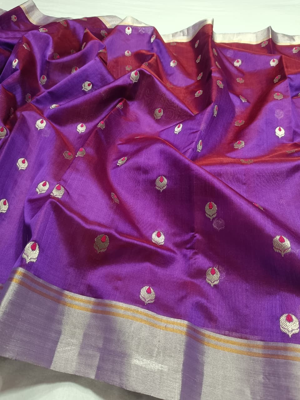 Royal Purple Pattu Silk Chanderi saree displayed in full to show the silver-toned border and drape