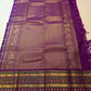 Vivid purple Pure Silk Kanjeevaram Zari Kattam saree with fine metallic lattice and alternating woven buttas.