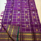 Full handwoven purple Zari Kattam saree with stacked traditional border and deep green outer edge.