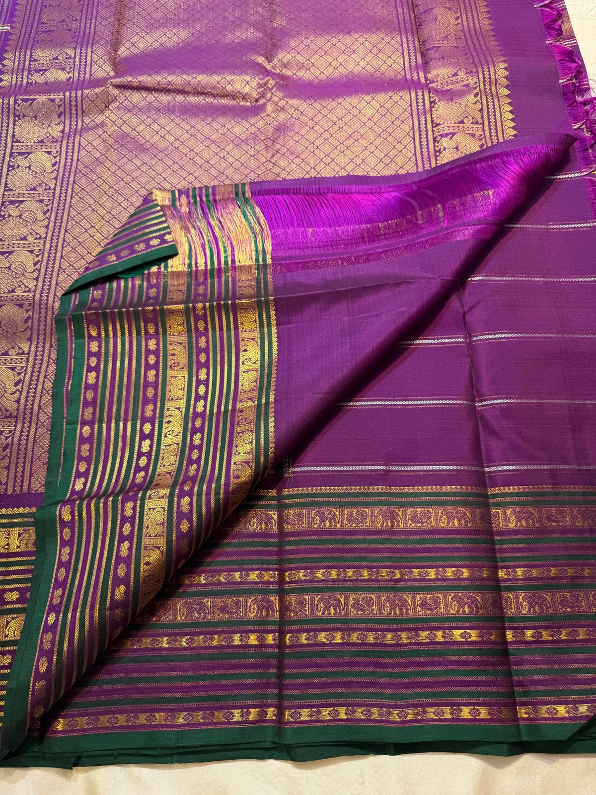 Purple Pure Silk Kanchipuram border with multiple narrow and broad handwoven zari registers.