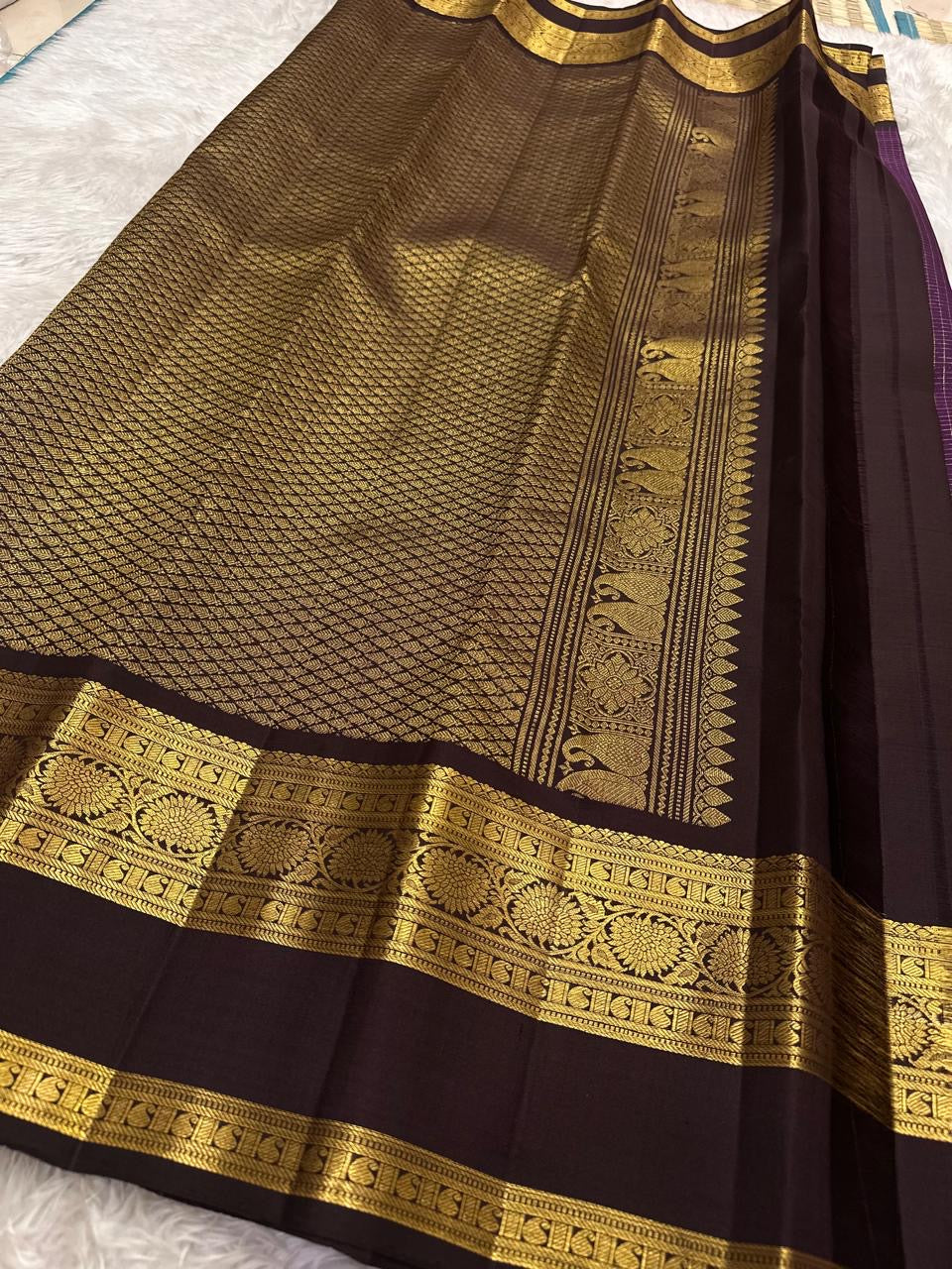 Dark Rettapet border with gold-zari detailing on a deep purple Pure Silk Kanjeevaram.
