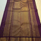 Detail of the Vairaoosi zari lines and gold buttas on the purple Kanjipuram saree
