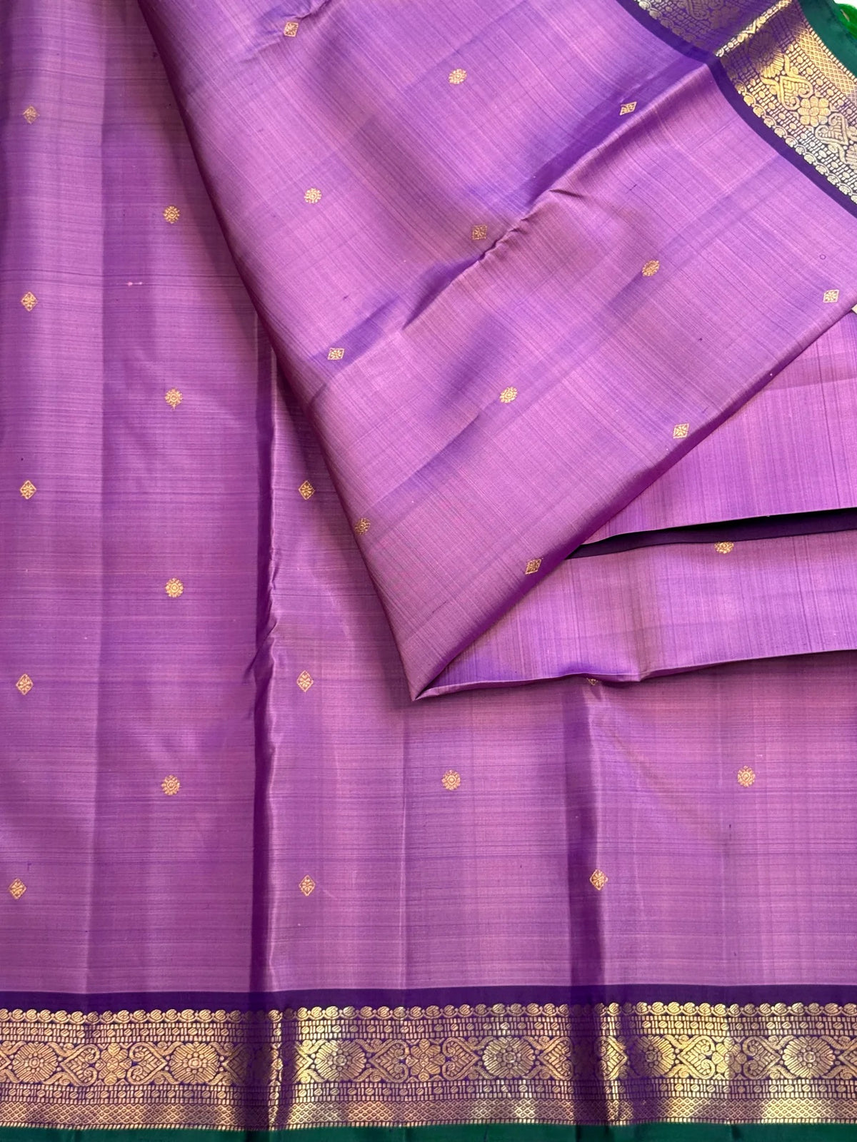 Pallu of lavender handwoven Kanchipuram silk saree with purple zari