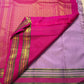 Silk thread mayil chakram butta close-up on radiant lavender Kanchipuram pure silk saree — Idam Living