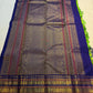 Varisaipet border detail showing layered gold zari bands against vivid lime-green Kanchipuram silk.