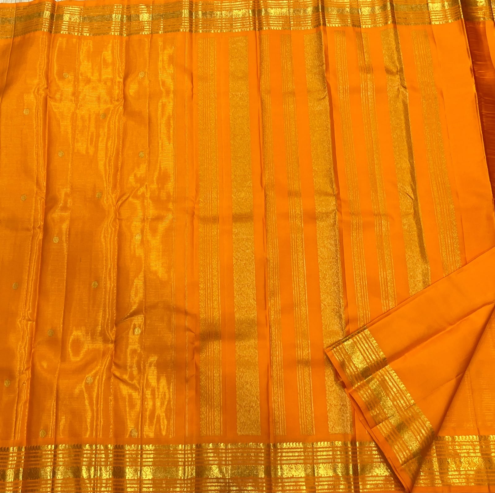 Radiant Marigold Orange KanchiPattu silk saree, 2 gm pure zari border close-up — Idam Living