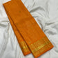 Radiant Marigold Orange KanchiPattu silk saree, border close-up detail — Idam Living