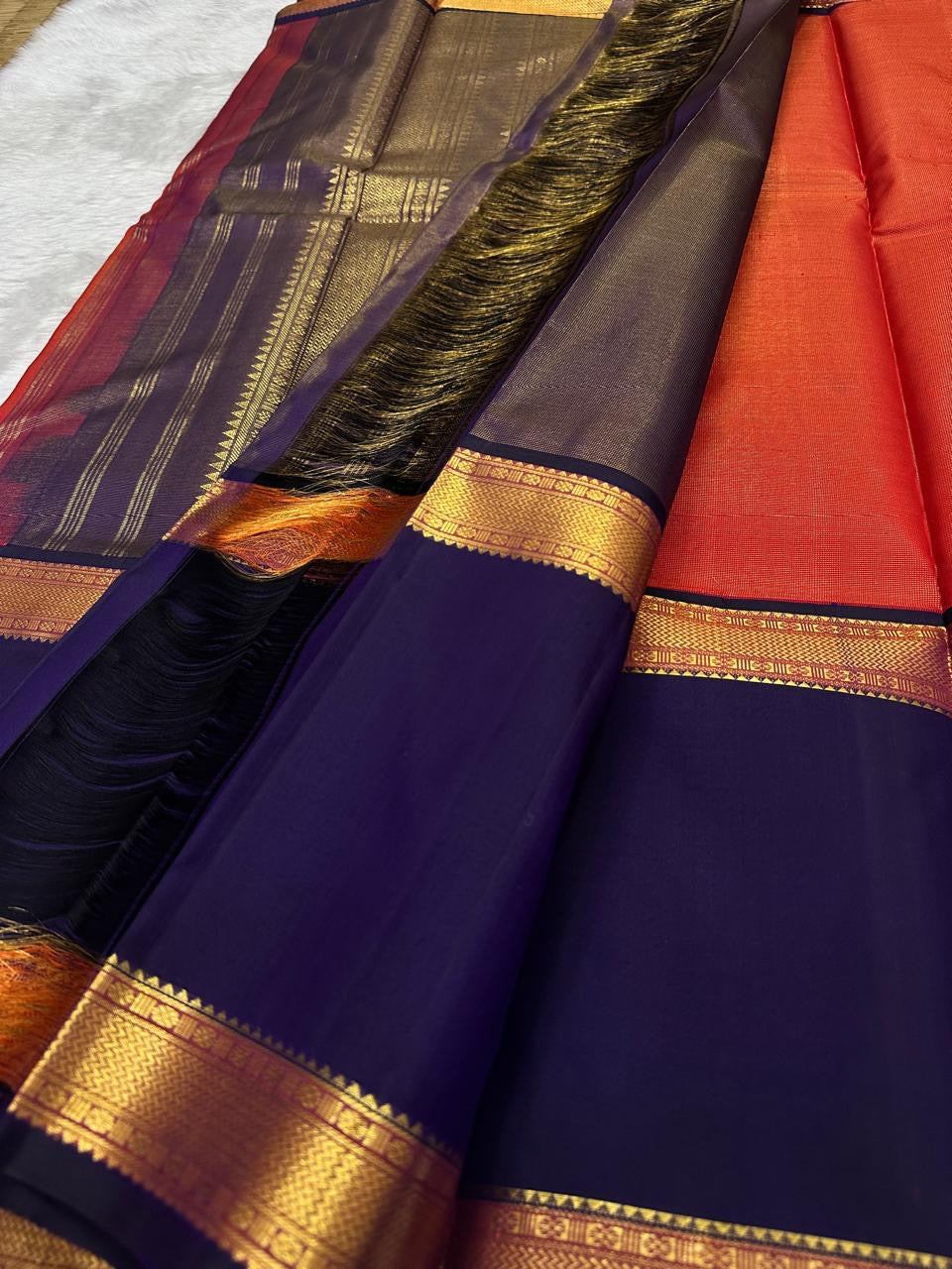 Radiant Sunset Orange Pure Silk Kanjivaram Rettapet saree with Deep Navy Blue border