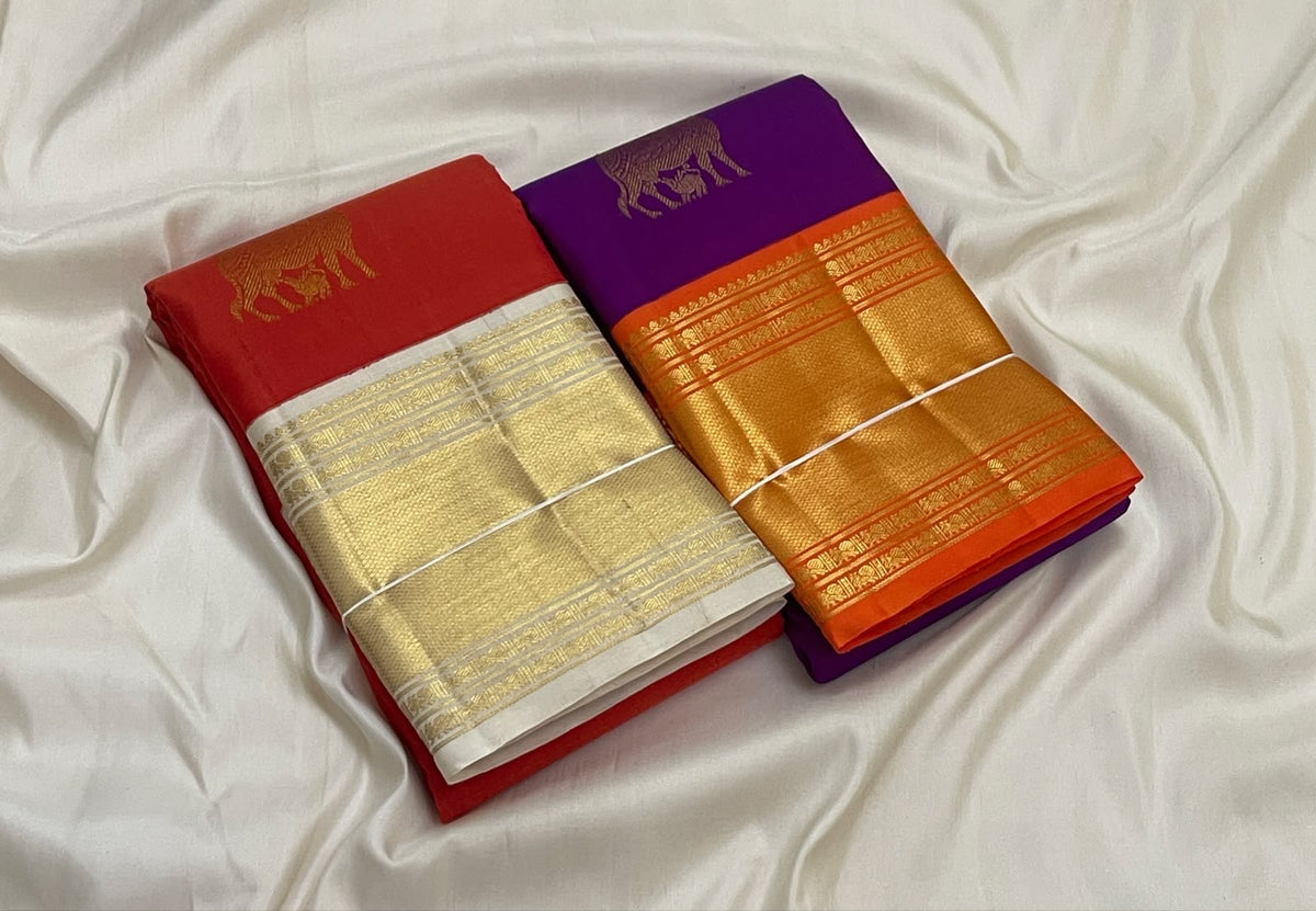 Pure Silk Kanchipuram Butta saree with broad Radiant Orange gold zari border