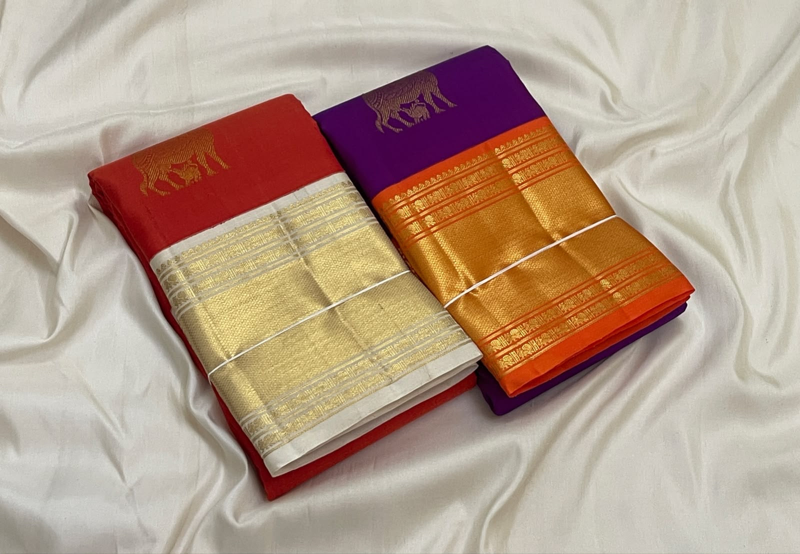 Pure Silk Kanchipuram Butta saree with broad Radiant Orange gold zari border