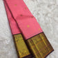Close view of Varisaipet body showing Mayil Butta and Maan Butta in gold zari on radiant pink Kanjeevaram silk