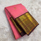 Deep plum Varisaipet border with Yazhi motifs in gold zari on radiant pink Kanjeevaram saree