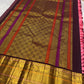 Deep plum Yazhi border pallu in gold zari on radiant pink Kanjeevaram saree