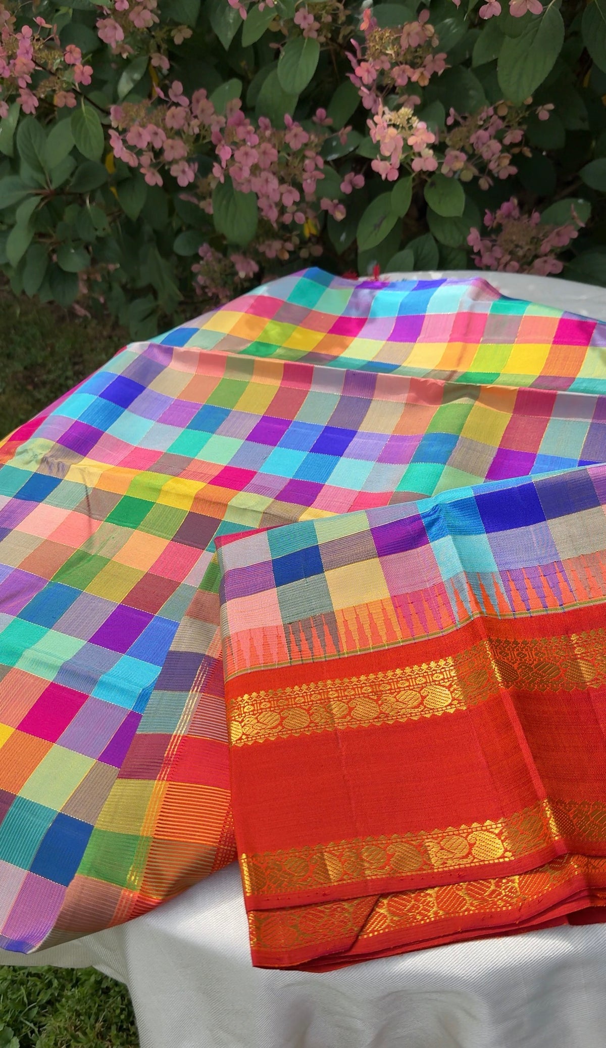 Rainbow checks Kanjivaram silk saree with kumkumam red Rettapet border