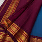 Ramar Blue pure silk Kai Korvai Kanchipuram saree with Arakku pinstripes, silk buttas and gold zari border.