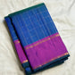 Blue silk Kanchipuram saree showing emerald-green colour play and fine gold checks