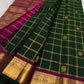 Rani-Magenta Kanchipuram border with broad antique-gold zari and repeated peacock imagery — Idam Living