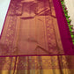 Close view of handwoven elephant zari border on Pachai Green and Rani Pink Kanjivaram silk.