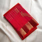 Chilli Reddish Pink Kanchipuram silk saree with antique-gold woven detailing.