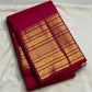 Close view of antique-gold multi-register Varisaipet border on vivid Rani Pink Kanjivaram silk.