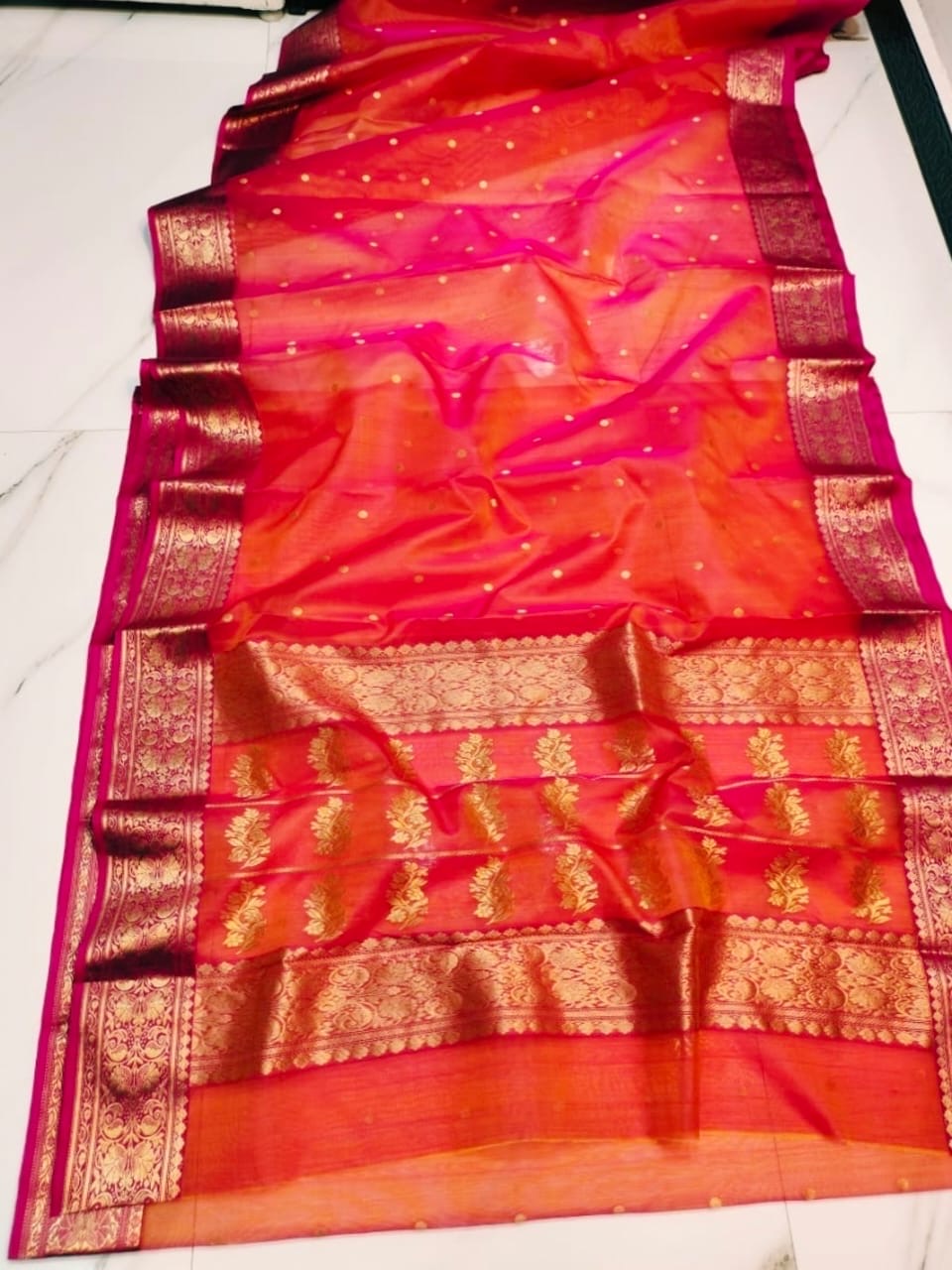 Rani-pink gold zari border detail on tangerine orange Katan silk Chanderi saree