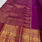 Rani Pink pure silk Kanjeevaram Butta saree with dense gold zari buttas and Mayil border.