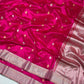 Rani Pink Pattu Silk Chanderi saree showing the broad woven metallic border.
