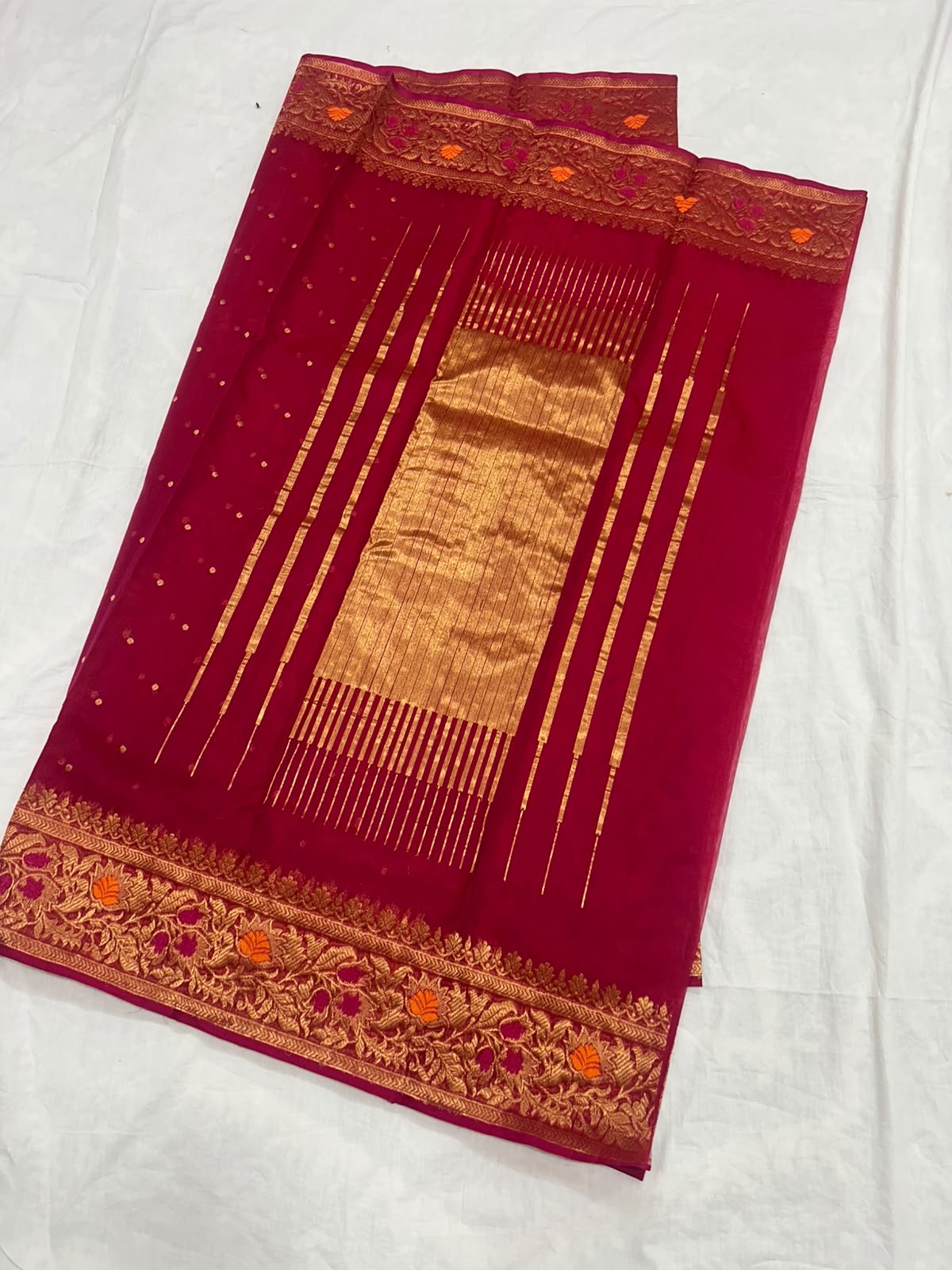 Rani Pink Chanderi saree with orange floral border accents