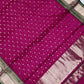 Rani pink Chanderi saree with silver-toned buttas