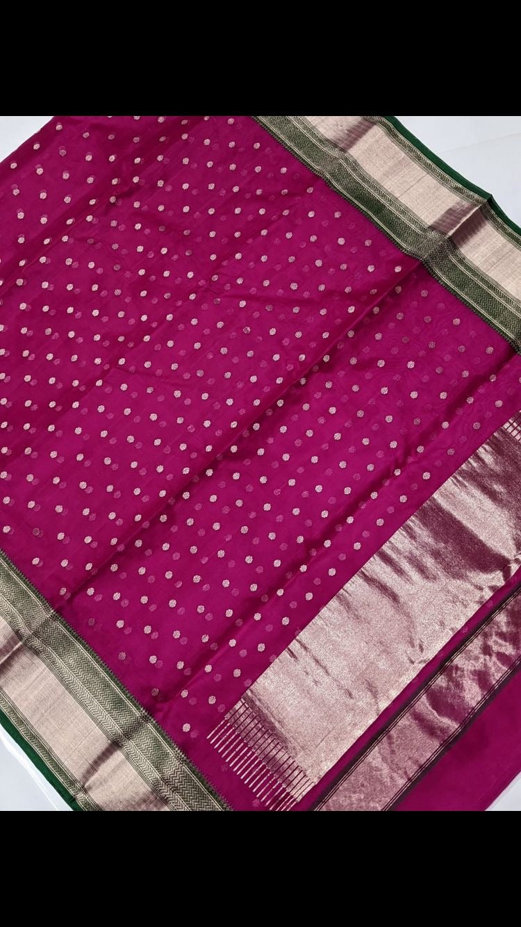 Rani pink Chanderi saree with silver-toned buttas