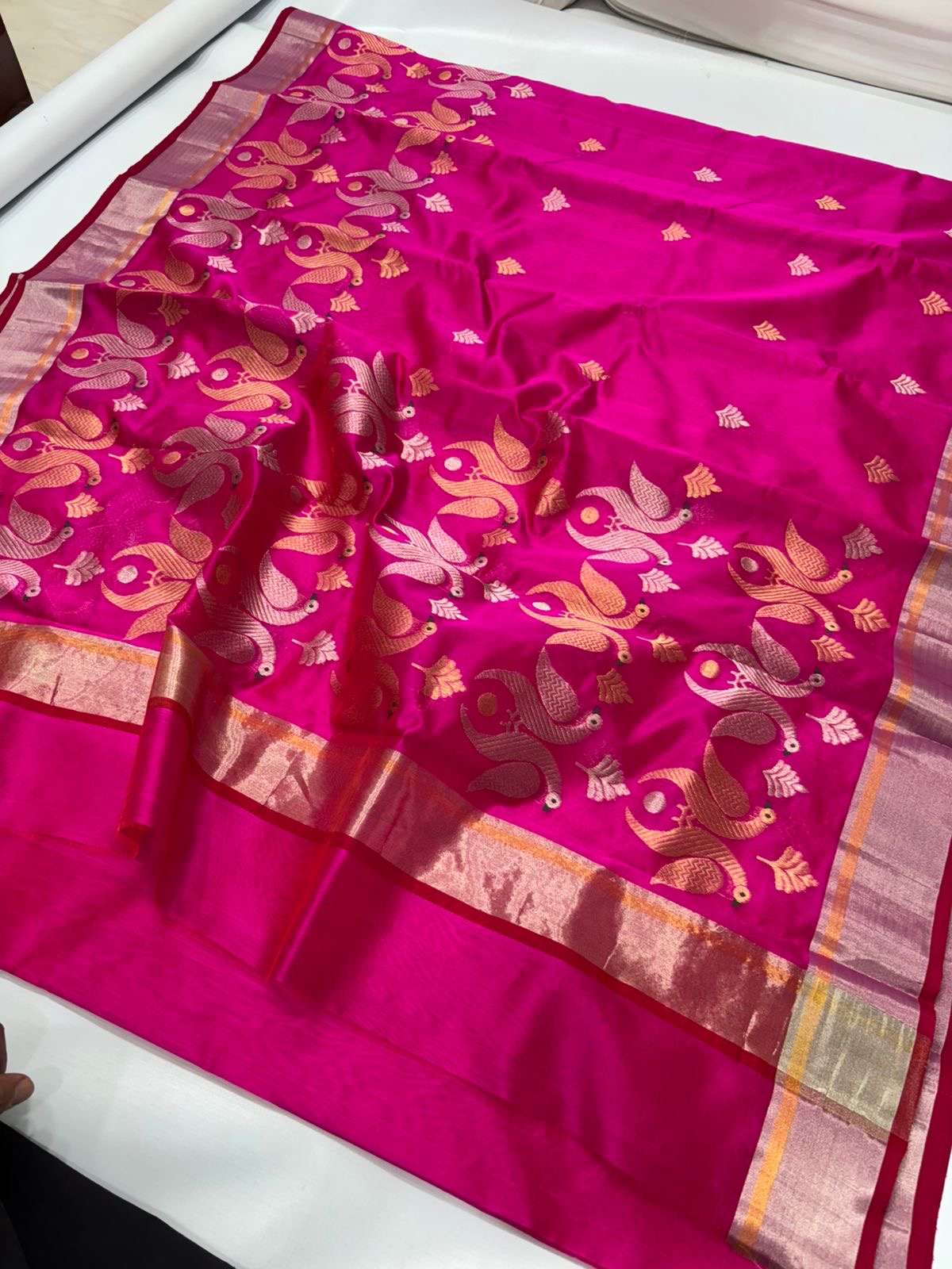 Rani pink Chanderi saree with gold-toned peacock weaving