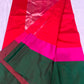 Vermilion red handloom Chanderi saree with bright rani pink border detail
