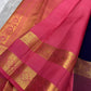 Rani Pink Kanchipuram border with broad floral gold zari, geometric separators and fine Reku-style bands.
