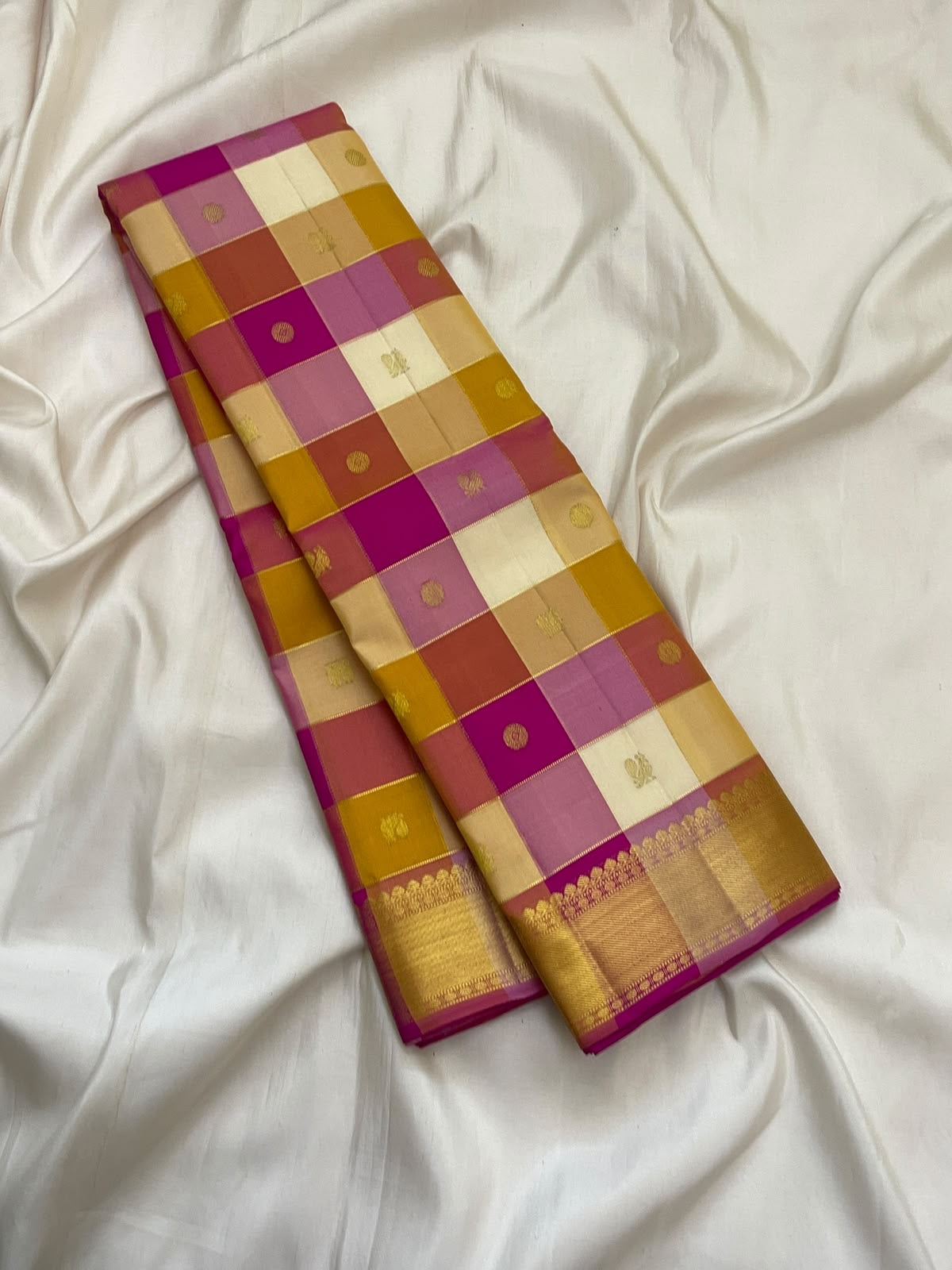 Grand Rani Pink pallu with dense antique-gold geometric zari weaving on Kanjivaram silk.