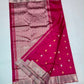 Full view of Rani Pink handloom Chanderi saree with scattered leaf buttas and expansive metallic pallu.