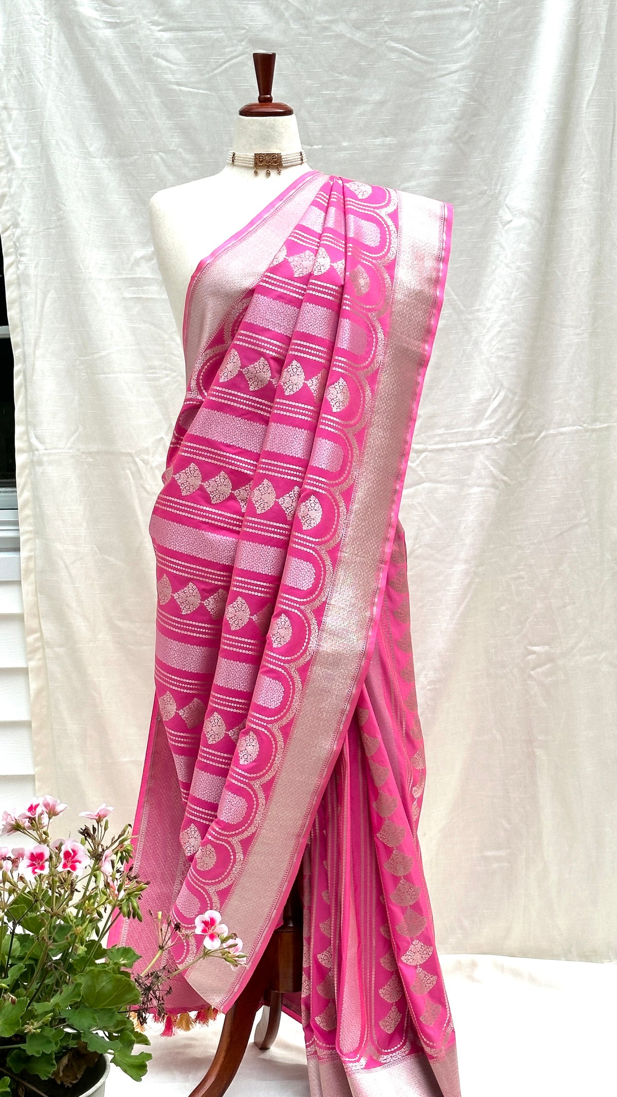 Handwoven raindrop buttas on Rani Pink Pure Katan Silk Banarasi saree