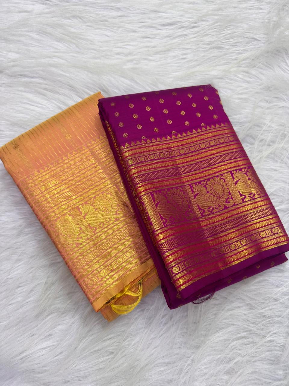 Rani Pink pure mulberry silk Butta saree with warm gold geometric and ornamental zari registers.