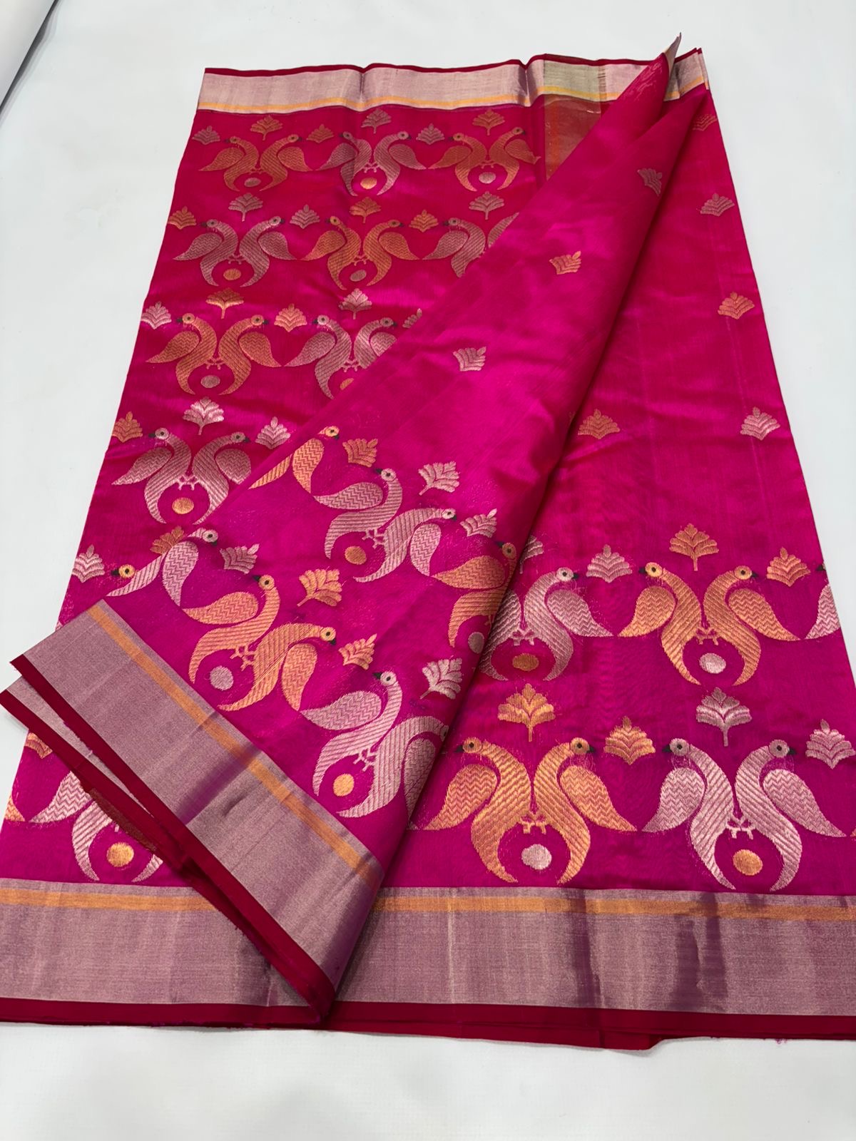 Rani pink Katan Silk Chanderi with metallic peacock design