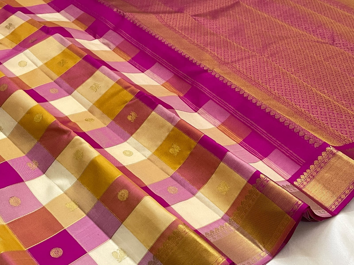 Warm Ivory Rani Pink mustard gold and dusty rose checked pure silk Kanjivaram saree.