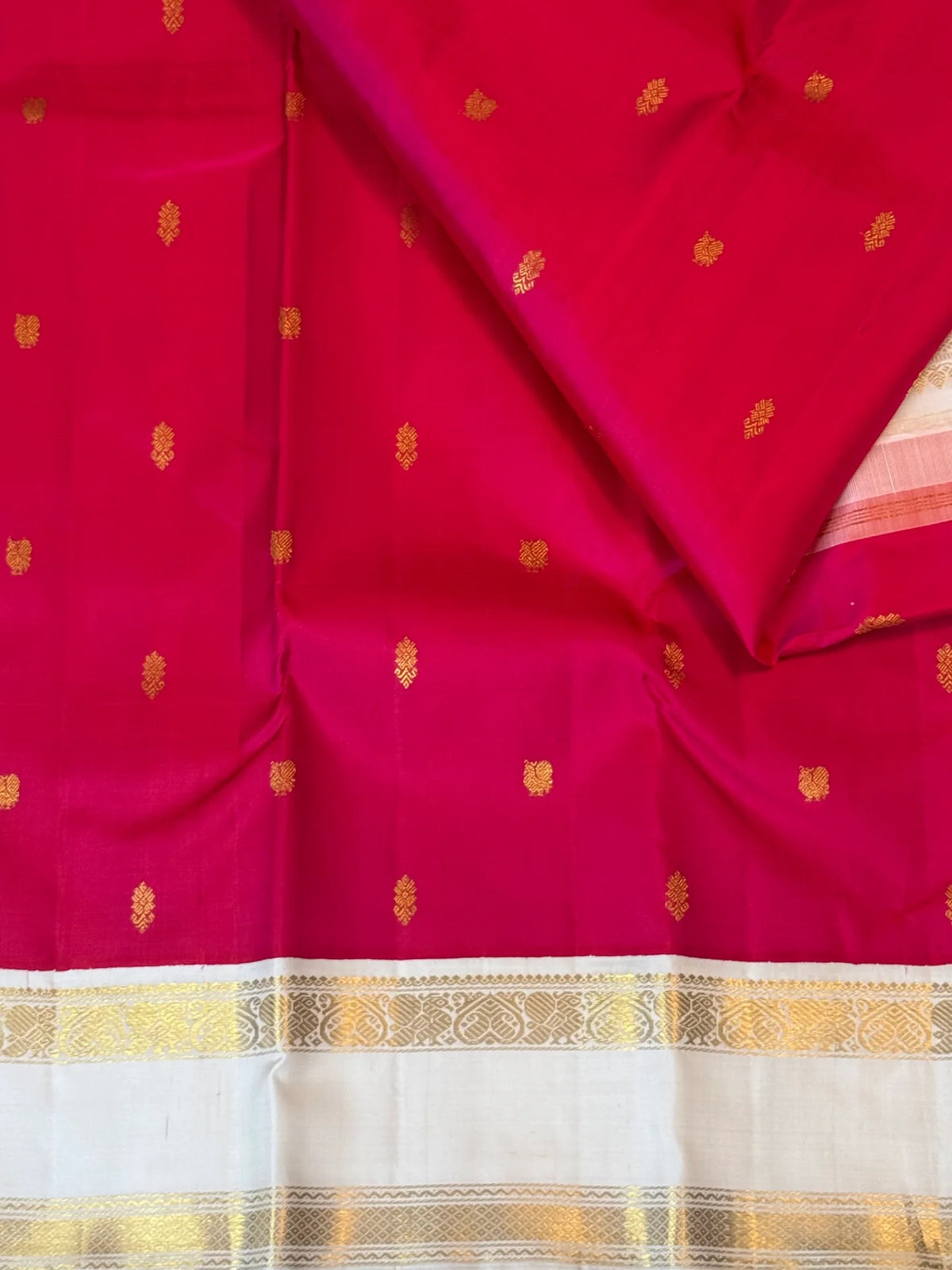 Rani pink Kanchipuram pure silk saree with handwoven Mayil zari