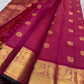 Rani Pink and classic-gold Kanchipuram border finished with a narrow Karum Pachai deep-green selvedge.
